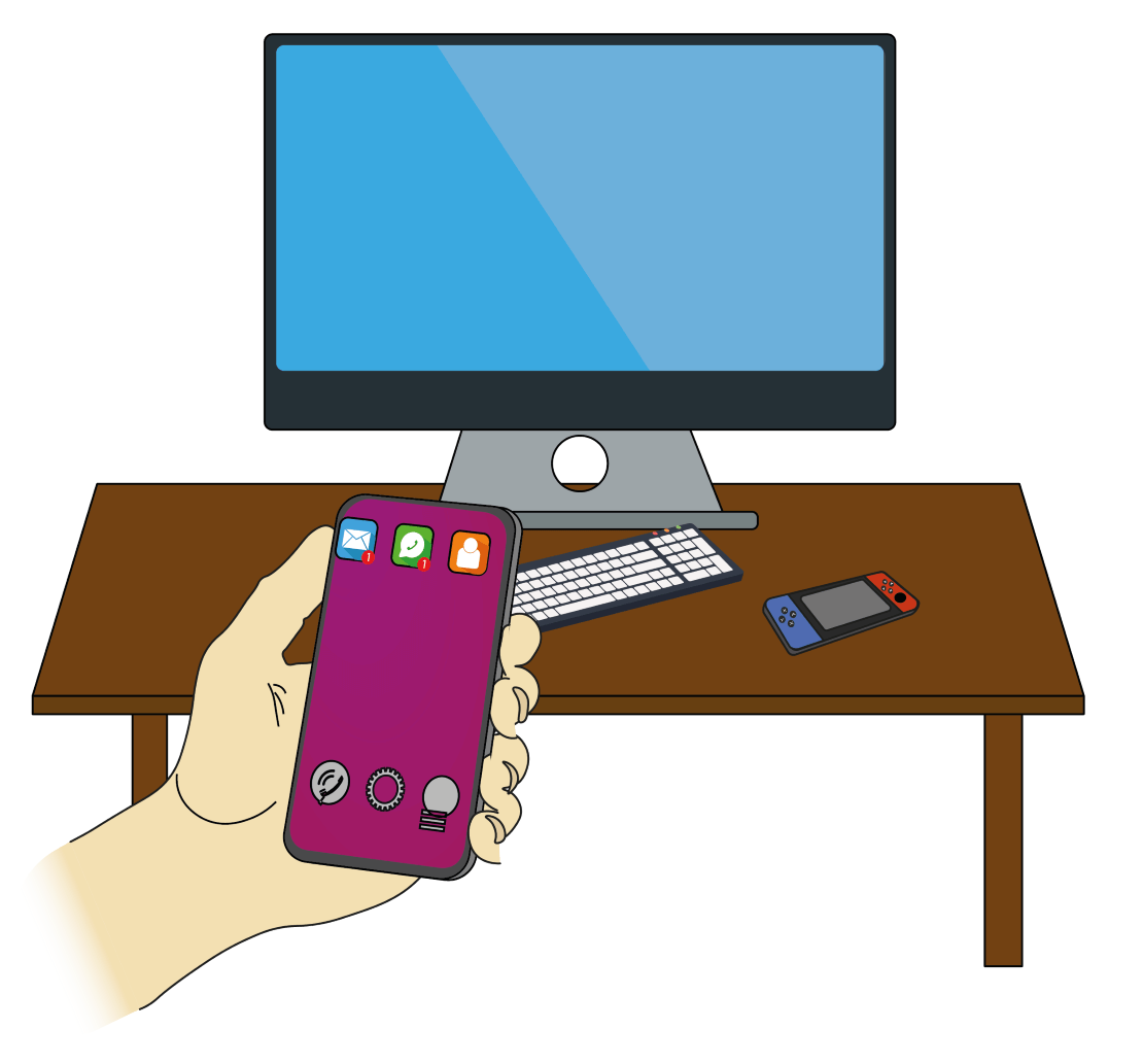 Ein Computer und eine Videospielkonsole stehen auf dem Tisch. Jemand hält ein Smartphone in der Hand.